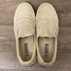 Converse cream slip ons